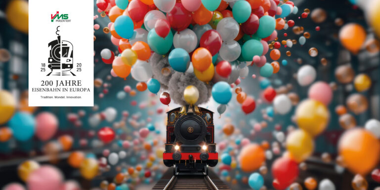 Bunte Ballons steigen aus dem Schornstein einer Dampflok